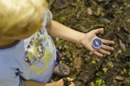 Child with compass